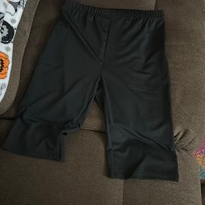 Black knee length capri shorts polyester material